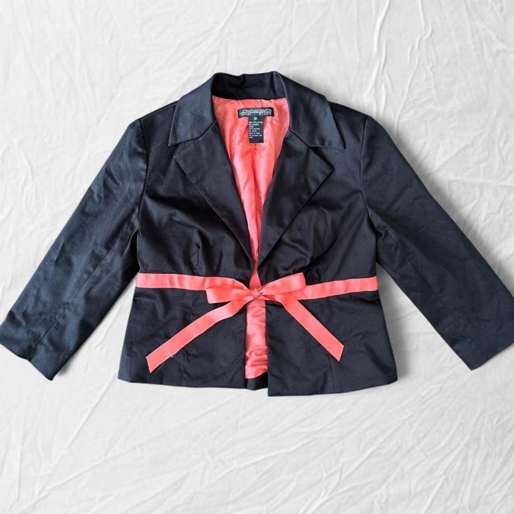 Jonathan Martin black blazer with coral ribbon